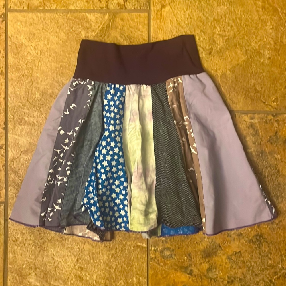 Boutique skirt with plum waistband and multicolored fabric panels. Size 6-8 girl
